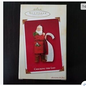 HALLMARK ORNAMENT CHECKING THE LIST 2002